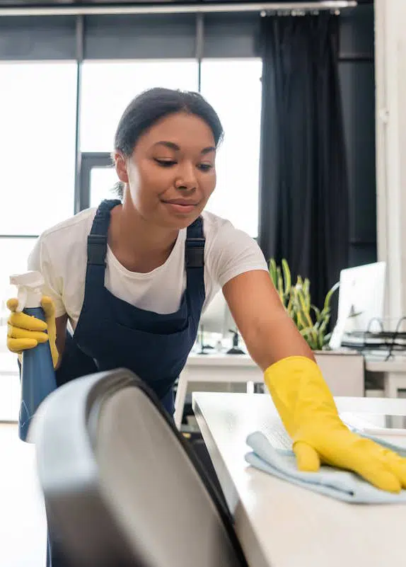 Happy-Commercial-Cleaner-Wiping-Office-Desk-gallery-tall-01b Janitorial Services